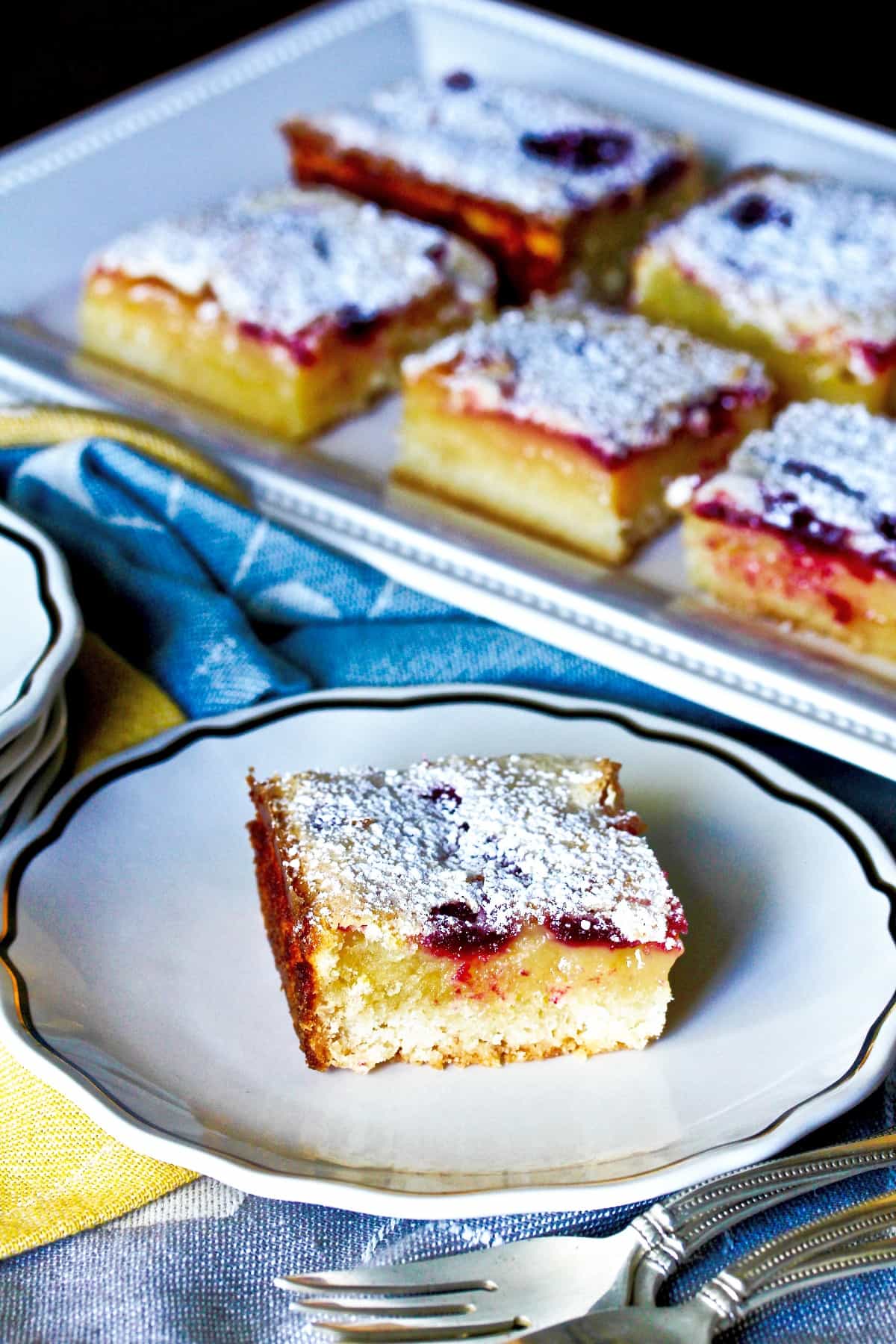 Blueberry lemon bars on a serving platter