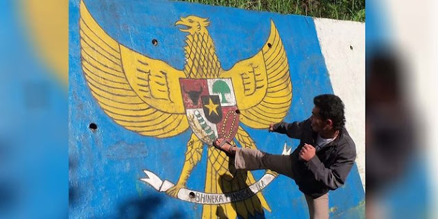 Pemuda ditangkap Polisi karena Tendang lambang Garuda Pancasila