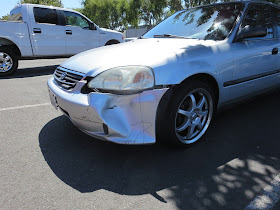 Civic with collision damage before repairs at Almost Everything Auto Body