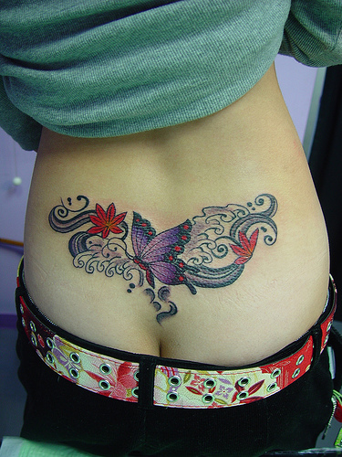 Awesome Star Tattoo Design on Back for Women