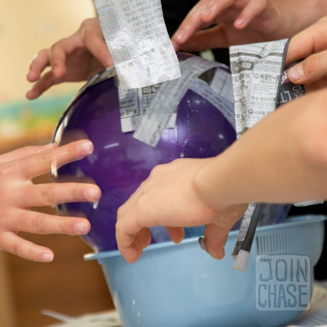 Students making a pinata during Winter English Camp at Bibong Elementary in Ochang, South Korea. 