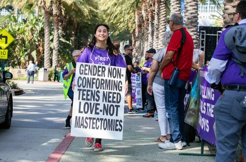 Chloe Cole takes part in a demonstration against “gender-affirming care” for minors in Anaheim, Calif., on Oct. 8, 2022. (John Fredricks/The Epoch Times)