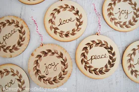 wooden ornaments decorated with wood burned details