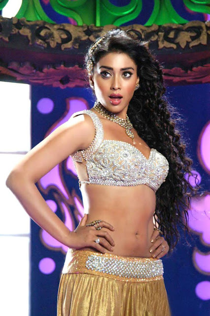 Shriya saran hot & spicy stills in pavithra , Shriya saran , Shriya saran hot stills,telugu actress Shriya saran spicy navel show photos in suriya movie,Shriya saran latest hot pictures,Shriya saran new gallery,Shriya saran hottest pictures,Shriya saran hot cleavage show photo ,Shriya saran latest hot bikini images, Shriya saranlatest hot photoshoot in 2013 march, Shriya saran hot & spicy stills, Shriya saran Hot Navel Show