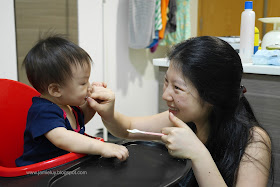 Mommy feeding baby Lance