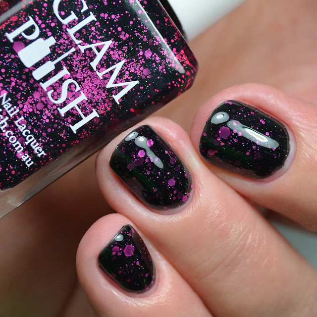 black nail polish with pink glitter three finger swatch