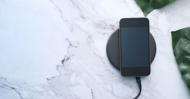 this is a picture of a wireless charging pad which is a must have mobile phone accessory in 2023