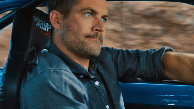 [Image: Paul-Walker-in-Car-Race.jpg]