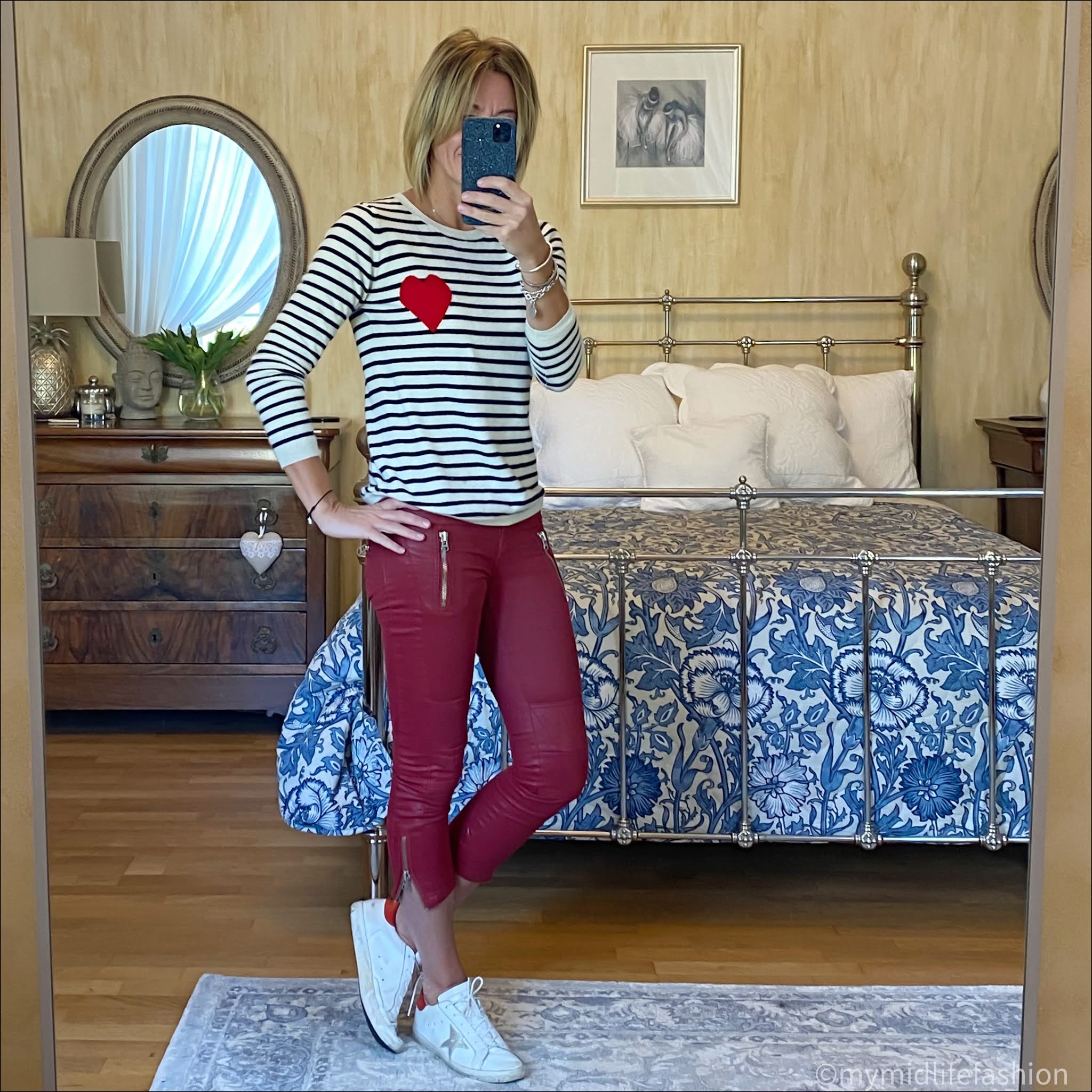 my midlife fashion, Chinti and Parker cream with  navy  striped heart cashmere sweater, golden goose superstar low top leather trainers, Isabel Marant Etoile wax coated biker jeans