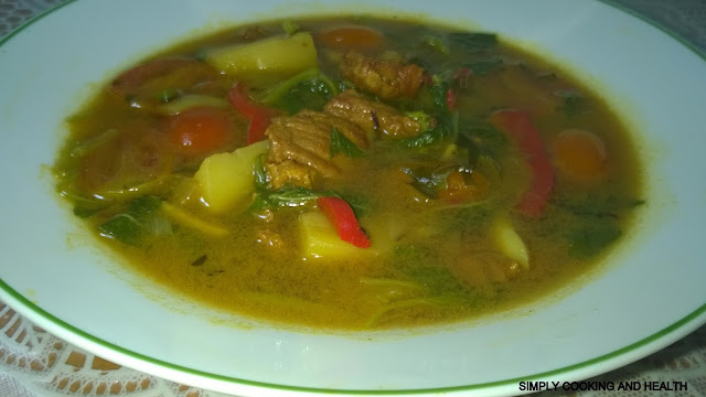 Spicy beef soup with spinach