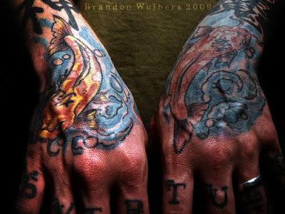 Hands Tattoo Design. The Tattoo on Right Hand more coloured
