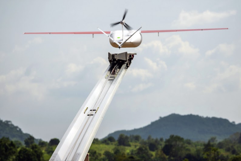 A drone flies to make a delivery at a Zipline hub in Vobsi, Ghana, in this photo provided by Zipline in 2021. Zipline, an American company that specializes in delivering medical supplies using autonomously flying drones, has launched in Japan.