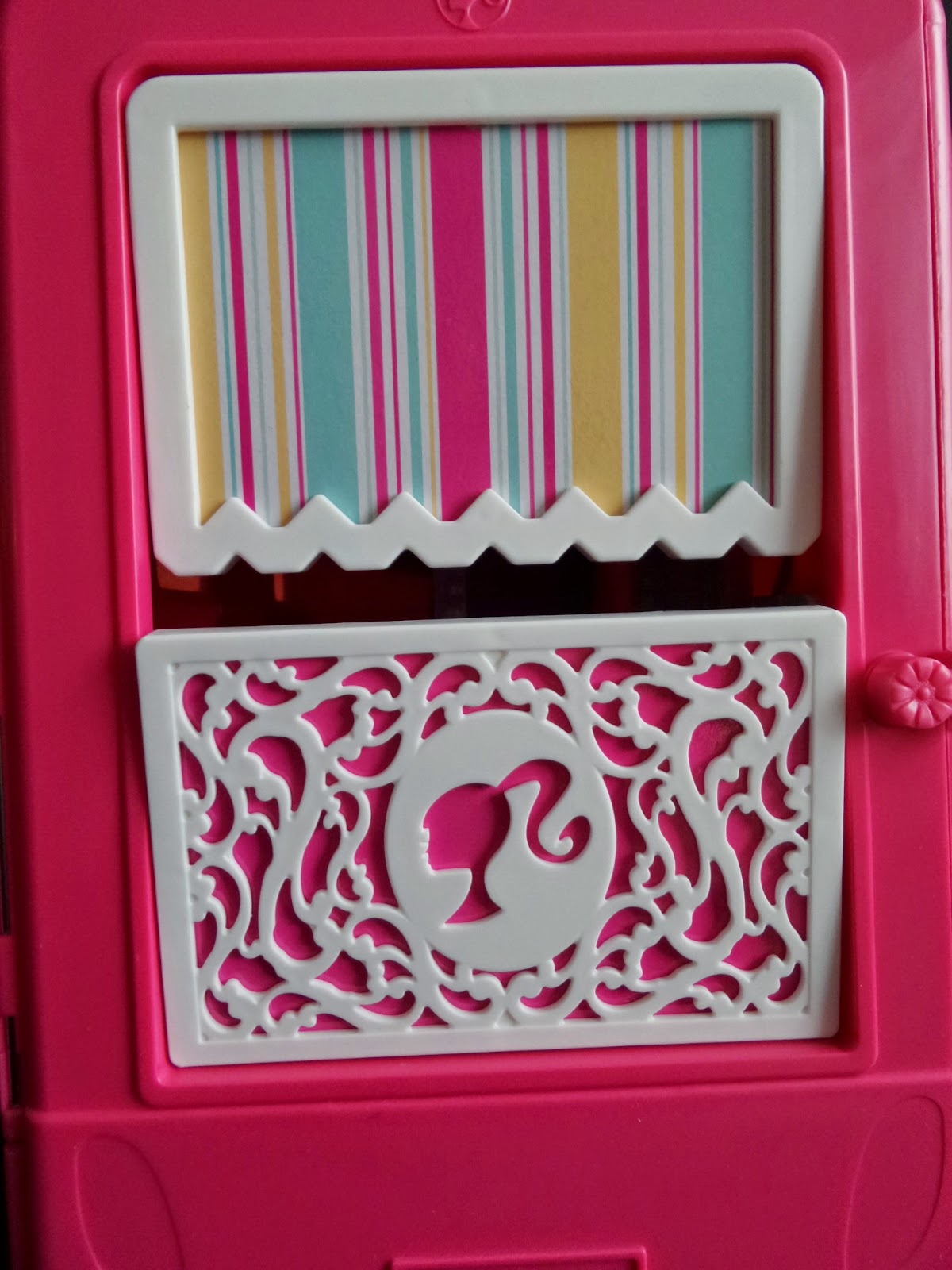 The outside of the back panel of the Barbie Glam Camper #Review
