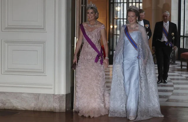 Queen Maxima wore a new gown by Jan Taminiau. Stuart Diadem and sea green Stuart diamond. Queen Mathilde