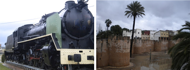 Vieja locomotora y murallas en Alzira