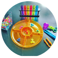 colour sorting tuff tray with rainbow test tubes and coloured letters to sort