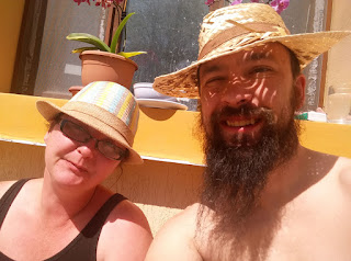 Sat in the sun wearing our sun hats