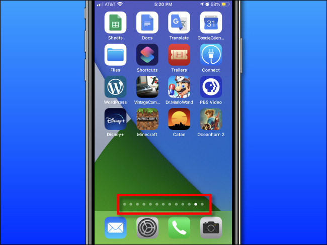 تظهر صفحة الشاشة الرئيسية أعلى Dock على iPhone.