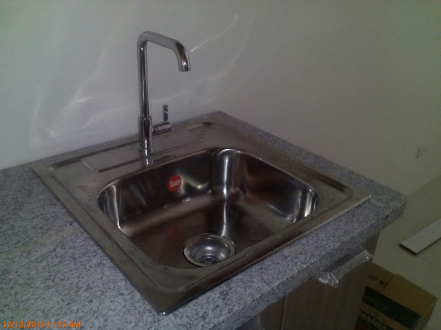 INSTALLATION OF KITCHEN SINK AND FAUCET