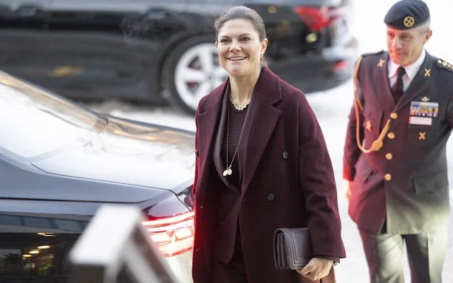 Crown Princess Victoria wore a burgundy wool Amanda coat by Greta Stockholm, and burgundy Sasha cool wool blazer by Filippa K