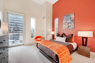 Bedroom with orange wall color