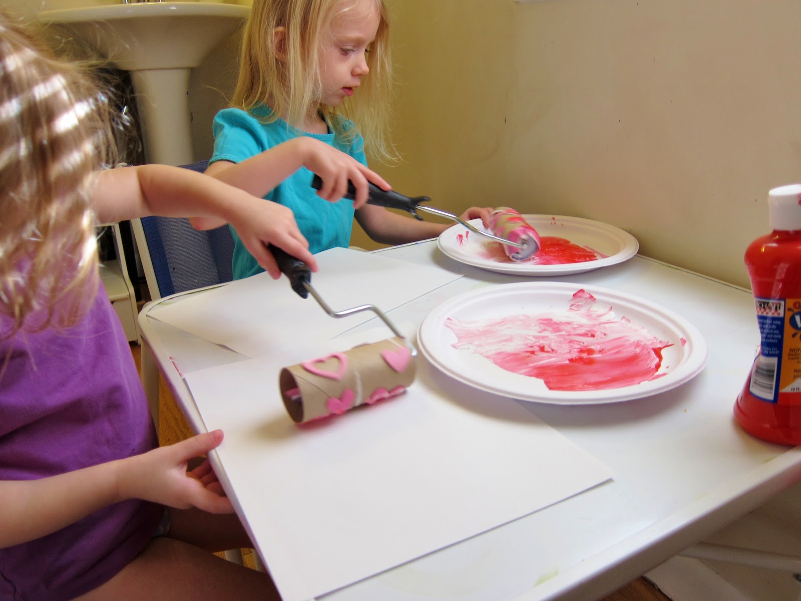 paint on paper plates and used a foam brushes to spread out the paint ...