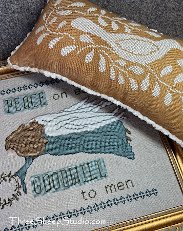 'Peace and Goodwill' and 'Fraktur Dove Pin Pillow' Cross Stitch Patterns by Rose Clay at ThreeSheepStudio.com