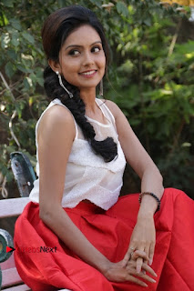 Actress Mahima Nambiar Latest Stills in White Top and Red Skirt at Kuttram 23 Movie Press Meet  0027.jpg
