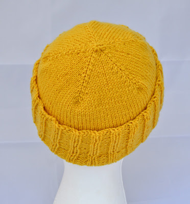 a hand knit hat for sale at https://www.etsy.com/shop/JeannieGrayKnits