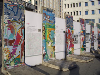 Berlin Wall Artwork and Graffiti and Political Cartoon Today