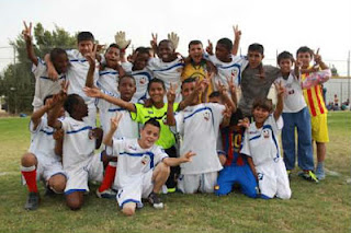 Israeli and Palestinian boys play soccer