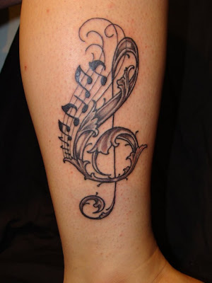 Music tattoo designs are perfect tattoos for those who love both music