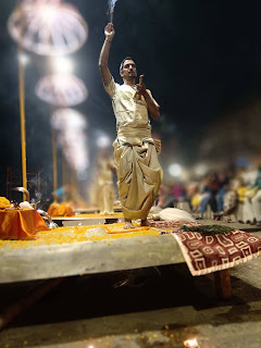 Priest performing Ganga Aarti