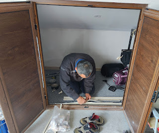 Bekir trimming and fitting the carpet