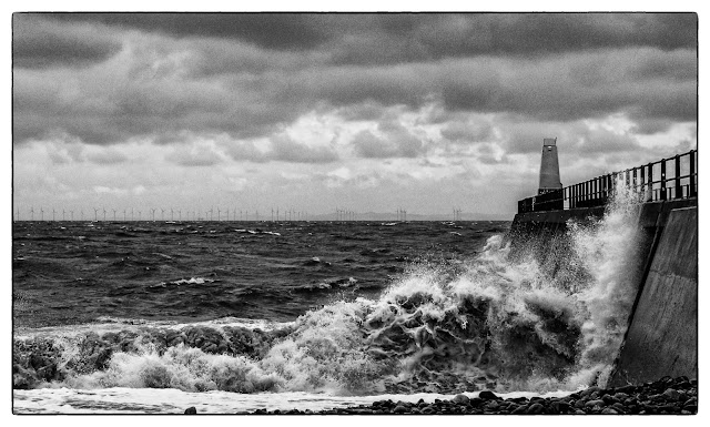 Black and white image of wild weather at Maryport