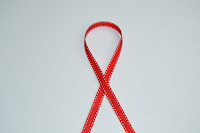 http://www.partyandco.com.au/red-grosgrain-ribbon-with-white-saddle-stitching-10mm/