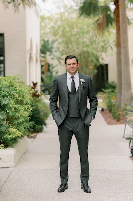 groom in grey suit