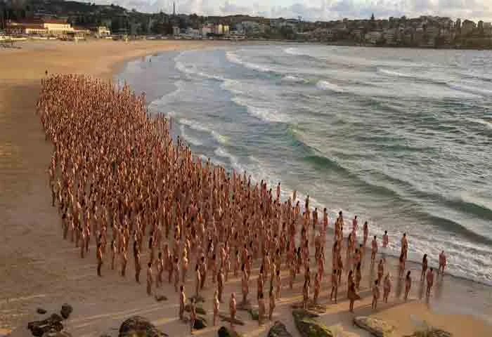 News,World,international,Cancer,Health,Video,Social-Media,viral, Australia, Thousands of Australians strip for cancer awareness photo shoot on Sydney's Bondi beach - Watch Video