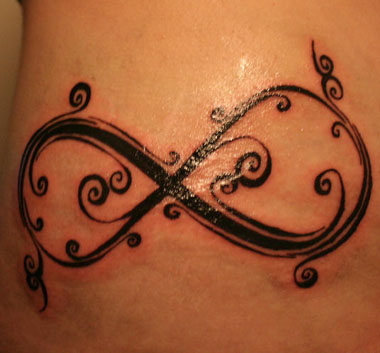 decorative symbol hip tattoo