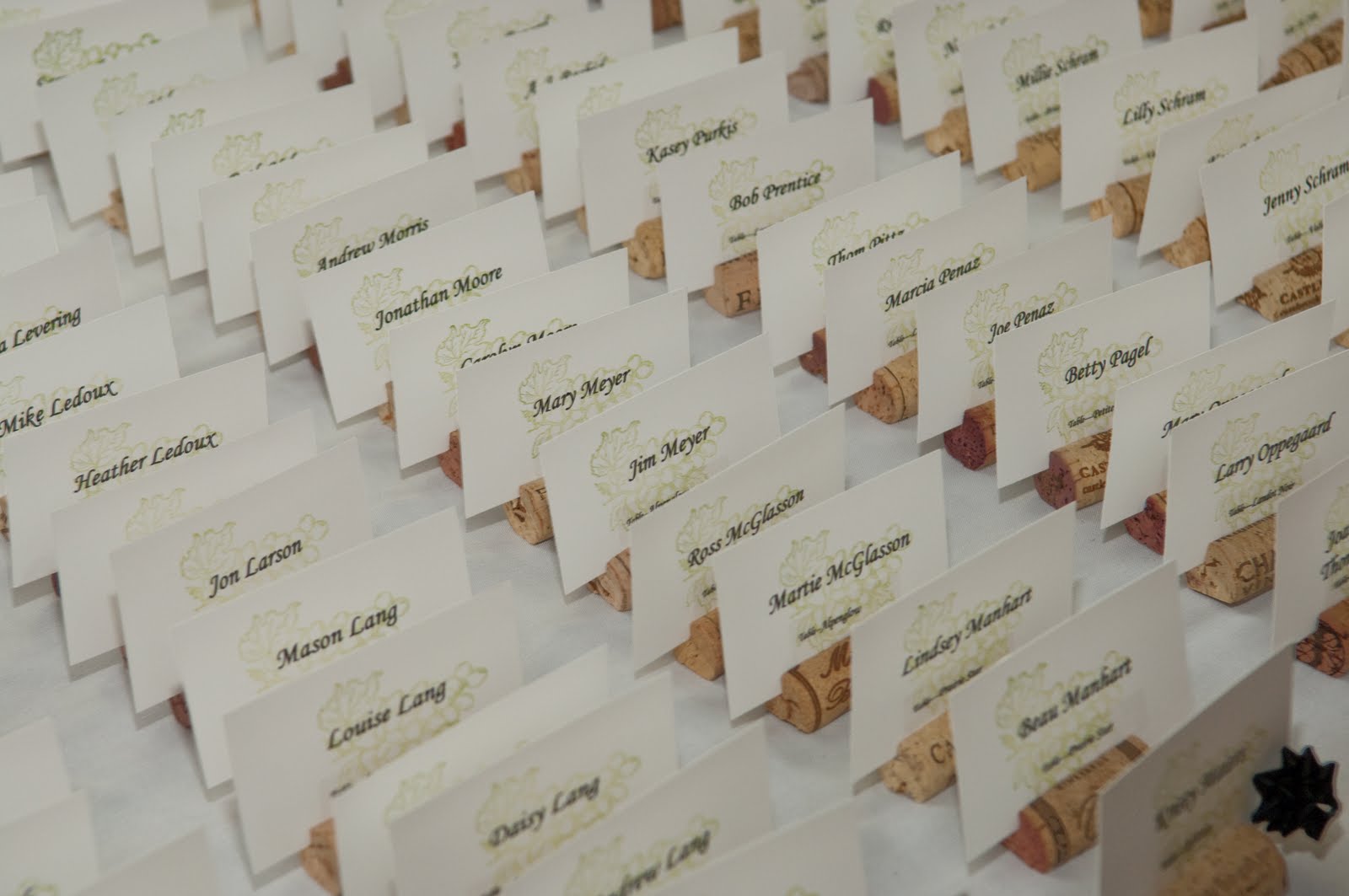 barn wedding seating chart wine corks