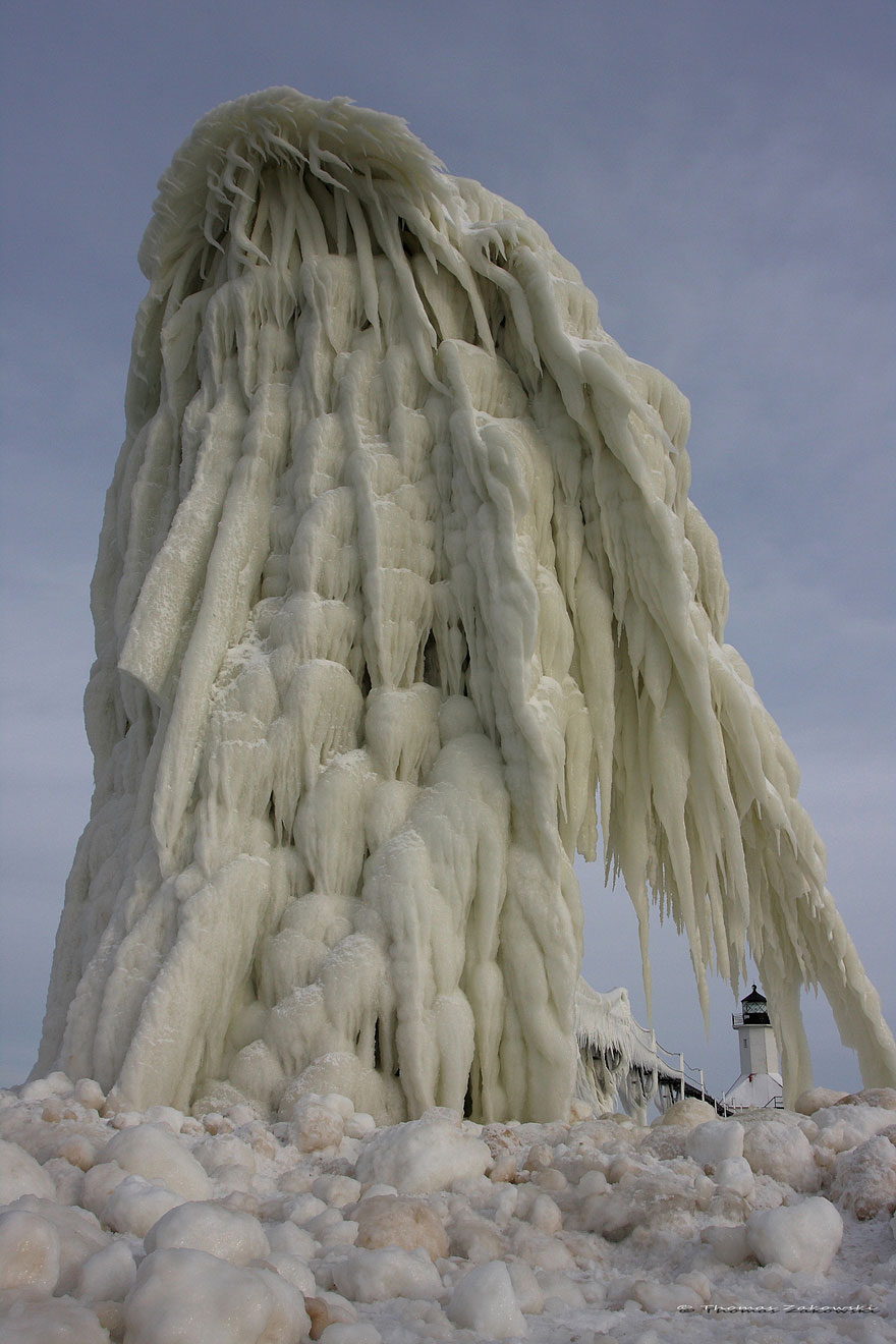 Stunning Frozen Lighthouses Caught In The Winter’s Icy Grip On Lake Michigan