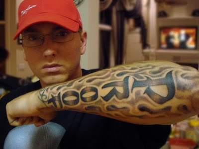 Arm Tattoos by Tony Hundahl of upper back name tattoos for guys