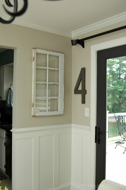 Updated dining room with Sherwin Williams Iron or and Accessible Beige.