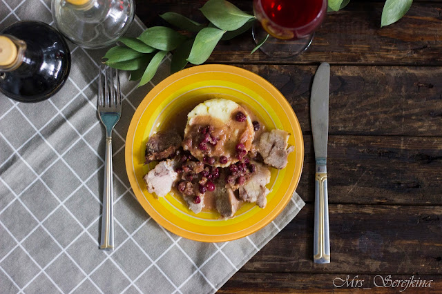 Meat with cranberries and mustard