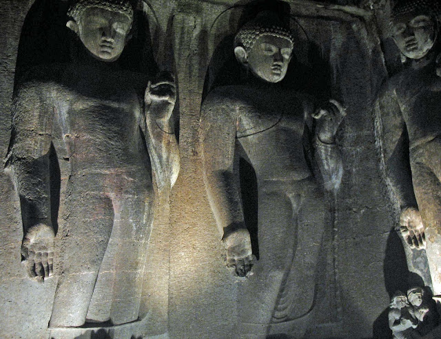 Buddha figures inside cave