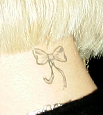 bow tattoo on back of neck. get a ow tattoo because I