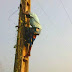 80 years old alleged witch trapped on electric pole (photos)
