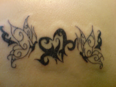 The one at upper back. This one is at the lower back