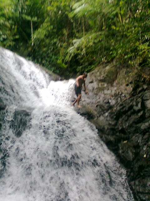 Enjoying the clear cool water of the falls