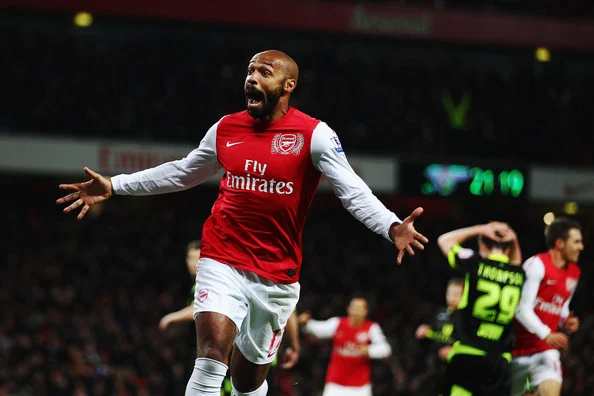 Thierry Henry of Arsenal celebrates scoring during the FA Cup Third Round match between Arsenal and Leeds United at the Emirates Stadium on January 9, 2012 in London, England